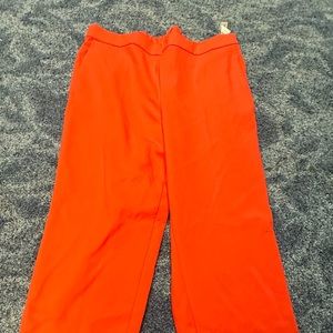 Brand new old navy coral/ orange colored pants. Size 12